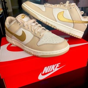 Women’s Dunk Low w/ gold swoosh